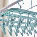 HOMEBOX | Swift Plastic Hanger with 32 Pegs - 32x32x25 cm | 165968746