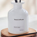 HOMEBOX | Balmy Electric Wood Reed Diffuser - 100 ml | 166070757