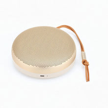 B&O | BEOSOUND A1 2ND GEN Waterproof Bluetooth Speaker with Voice Assist & Alexa Integration Gold Tone | TE0158893